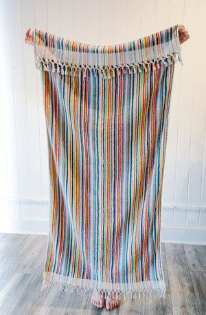 
            
                Load image into Gallery viewer, Striped Rainbow Towel-Blanket with Tassels
            
        