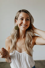 Jamie wearing the KISA Crochet Earrings in Olive