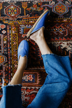 Blue Leather Mules with Trim paired with cut-off blue jeans